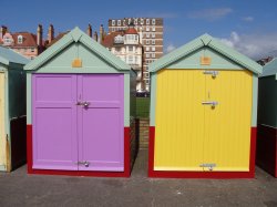 2 beach huts with different style doors